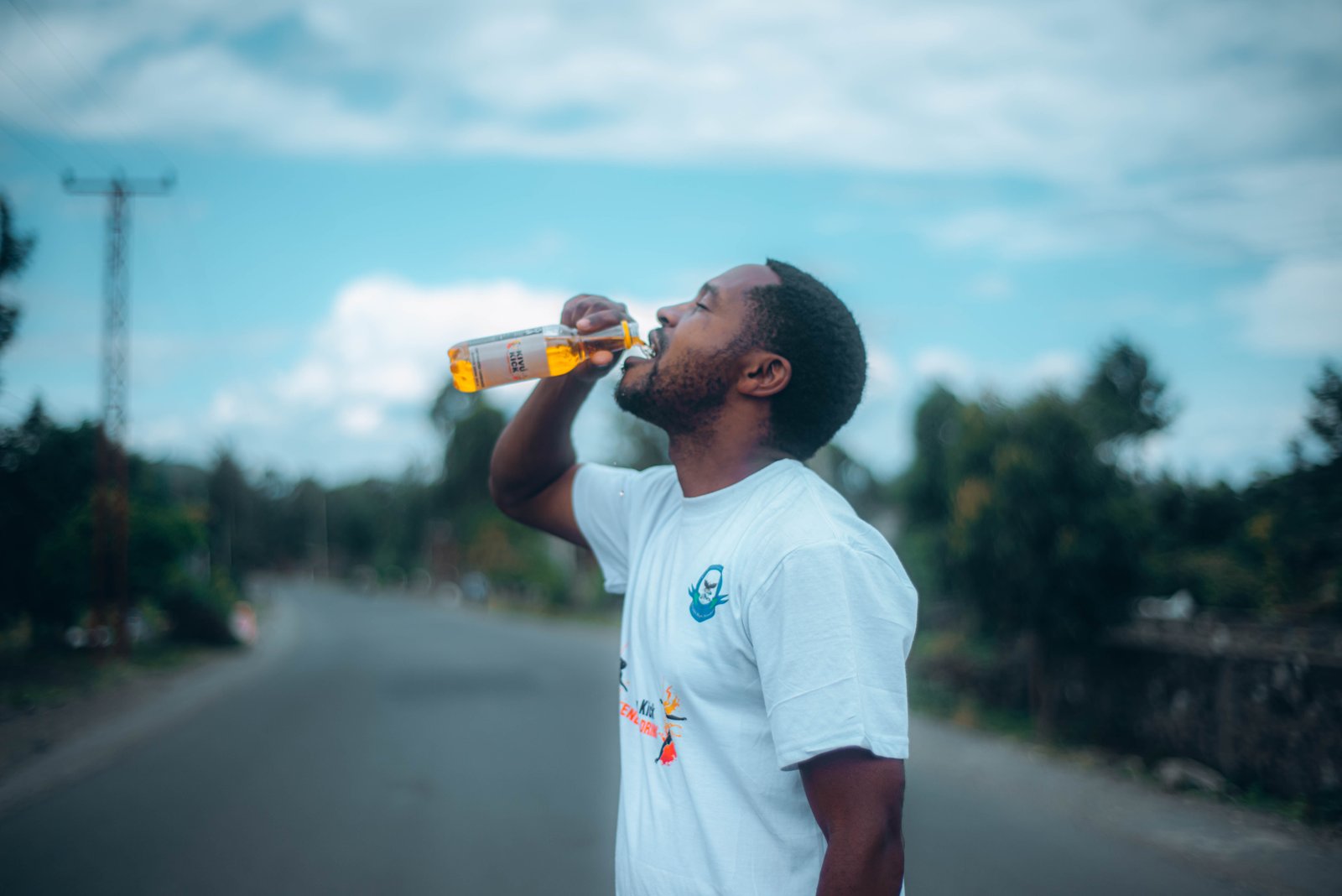 Drinking Kivu Kick on the road in Goma